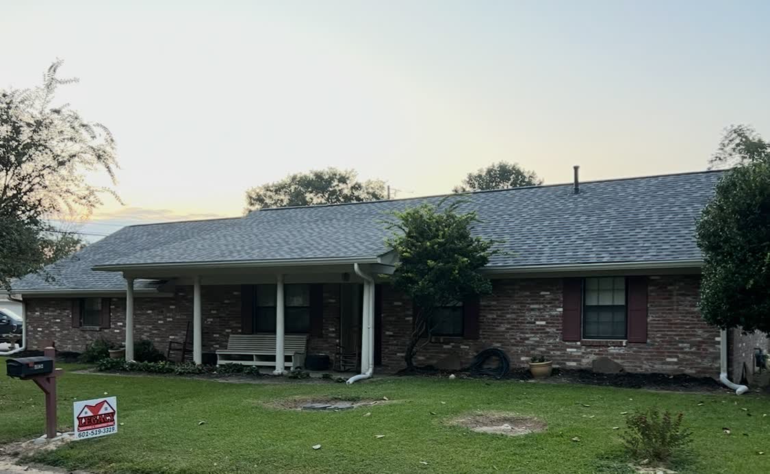 Completed residential roof replacement at sunset in Florence, Mississippi
